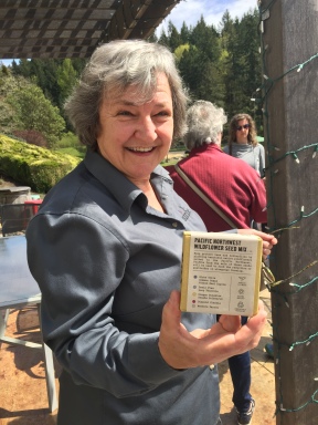 Airlie winery owner Mary Olson showing off her Buzz Box with bee-friendly native plant seeds. Agricultural land is heaven for bees if pesticides use is controlled properly